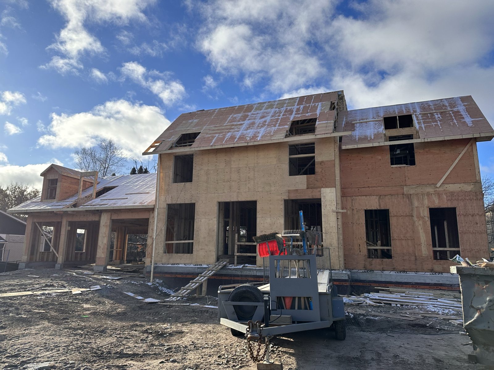 Sheathed elevation with dormers at the Cavell Avenue shell, King City