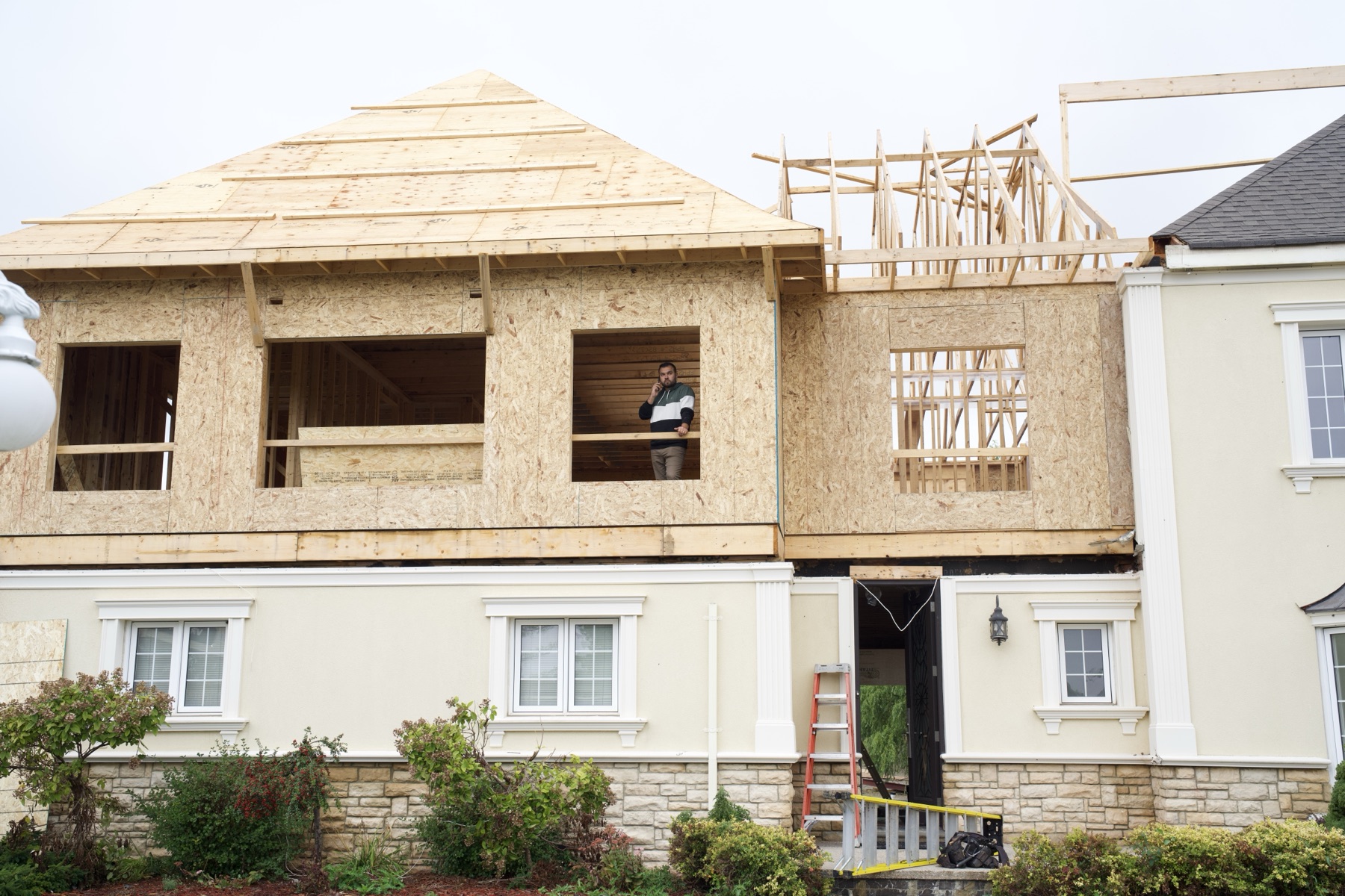 Custom home framing and front elevation in progress